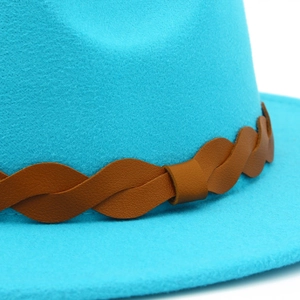 Turquoise wool felt fedora hat featuring a brown braided leather band for a stylish look