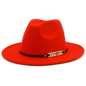 Red felt wide brim fedora hat with black band and gold rhinestone buckle detailing