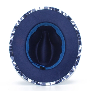 Detailed top view showing checkered edge trim and adjustable inner band of the navy blue fedora