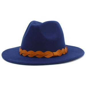 Detail view of navy blue fedora wool hat with brown braided faux leather band decoration