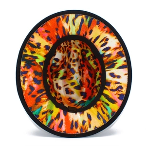 Top view of broad brim wool felt fedora featuring vibrant neon leopard print pattern