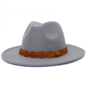 Detail of grey wool fedora hat featuring a brown braided leather band decoration