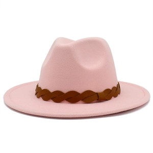 Detail of pink wool fedora hat featuring a brown braided leather decorative band