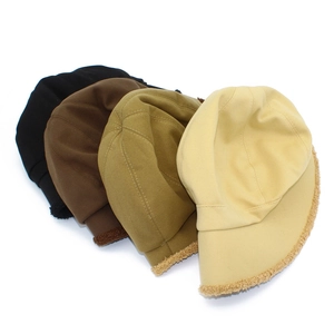 Detail view of winter docker hats in four colors with warm fleece lining and cotton fabric