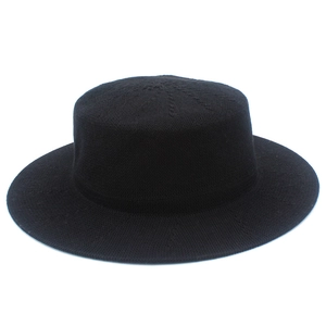 Close-up of the fine knit texture and flat top design of this elegant black boater hat