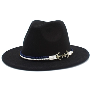 Detail of black wool fedora featuring blue and white nautical rope and silver anchor charms