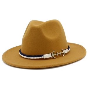 Close-up of tan fedora with nautical anchor buckle and twisted rope decoration