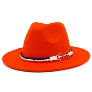 Detail of orange wool fedora featuring blue-white braided rope and gold anchor buckle
