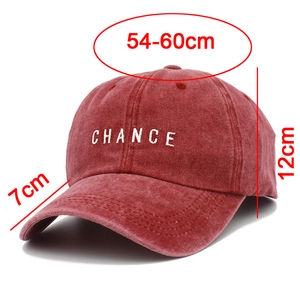 Detail view of retro washed red baseball cap with dimensions and Chance embroidery