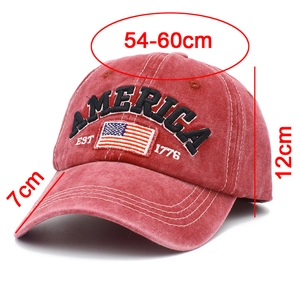 Detail view of red vintage cotton baseball cap with size specifications and embroidery
