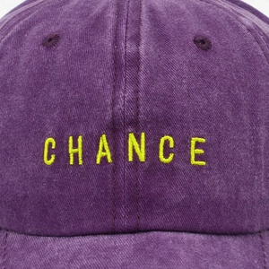 Vintage purple cotton baseball cap featuring high-contrast yellow Chance letter embroidery