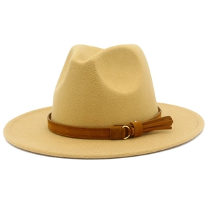 Detail of camel wool fedora hat with brown leather belt and gold ring accent