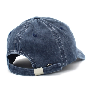 Close-up of cotton baseball cap with white contrast stitching and adjustable metal buckle