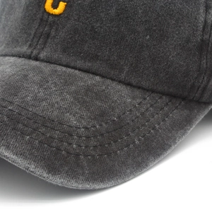 Vintage dark grey washed cotton baseball cap with orange embroidered letter C detail