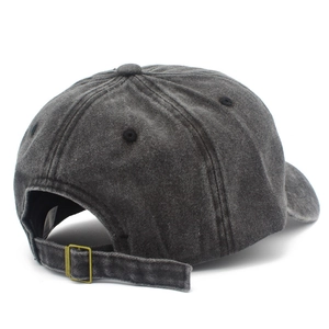 Detail view of the vintage washed cotton baseball cap with adjustable metal buckle back