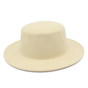 Close-up of beige wool boater hat featuring refined texture and neat stitching details
