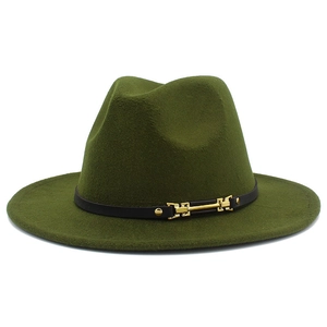 Detail of olive green fedora hat featuring a black leather band and gold metal buckle