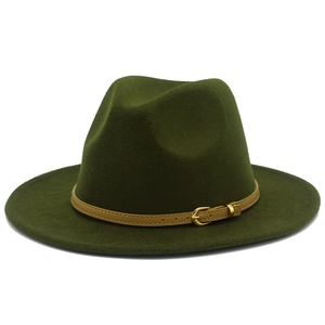 Detailed texture of dark green fedora hat with khaki leather strap and metal buckle