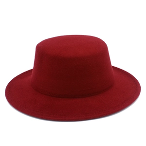 Flat top wine red wool felt boater hat with a wide stiff brim for men and women