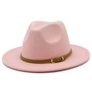 Detail of light pink wool fedora hat featuring a tan leather strap and gold buckle