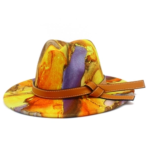 Detailed close-up of colorful tie-dye wool fedora with brown leather hatband and knots