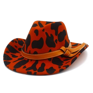 Classic western cowboy hat with orange and black cow print and brown leather band