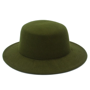 Detailed close-up of dark green wool felt flat top fedora hat showing fine stitching