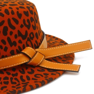 Stylish orange leopard print wool felt fedora hat with decorative leather belt detail