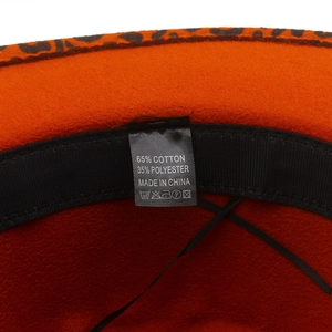 Close-up of hat interior showing the 65% cotton 35% polyester material label and sweatband