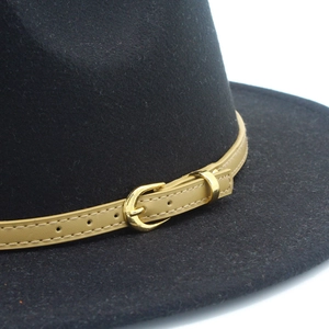 Black wool fedora hat featuring a beige leather band and polished gold metal buckle detail