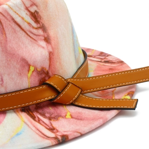 Pink tie-dye wool fedora hat with brown leather band and intricate white stitching
