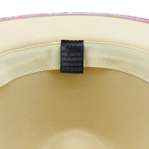 Detail shot of the interior hat lining showing cotton blend fabric and the care label