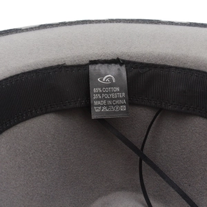 Detail view of the gray fedora inner lining with cotton polyester label and sweatband