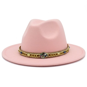 Detailed shot of pink fedora hat featuring ethnic beads and colorful stone buckle