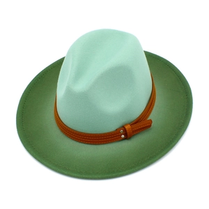 Detail of green wool fedora showing brown leather band and metallic rivet accents