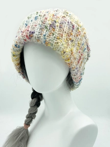 Detailed view of rainbow speckle knit beanie with thick vertical rib texture for women