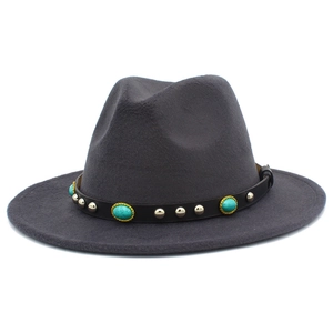 Detail of dark grey fedora with leather band featuring turquoise and silver rivets