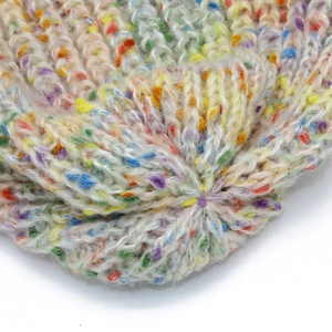 Chic rainbow confetti knit beanie hat featuring thick ribbed texture for winter warmth