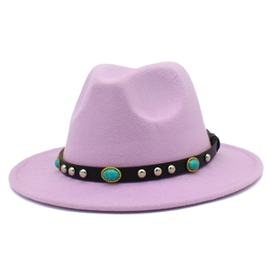 Detail of lavender fedora hat featuring a black leather band with turquoise and silver studs