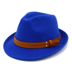 Close-up of royal blue wool fedora hat with double-layered brown faux leather belt buckle