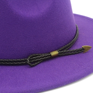 Deep purple wool felt jazz fedora featuring a black braided cord and gold arrow buckle