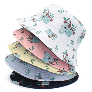 Close-up of five cartoon koala bucket hats in white, pink, yellow, blue, and black colors