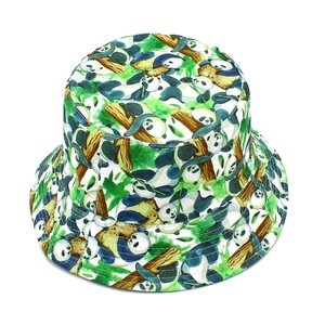 Detail of creative panda print bucket hat featuring green leaves and bamboo patterns