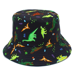 Reversible black bucket hat featuring colorful dinosaur and palm tree patterns for sun protection