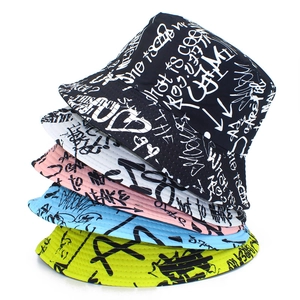Vertical stack of graffiti bucket hats in five vibrant colors with street art patterns