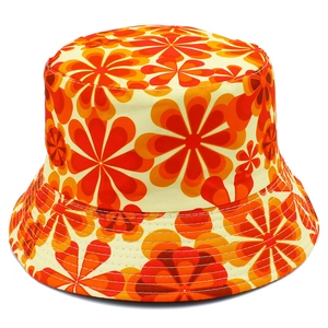 Unisex reversible bucket hat featuring vibrant retro daisy floral print on cotton canvas