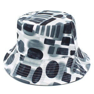Unisex bucket hat with black and white abstract geometric prints for outdoor fashion