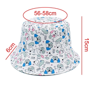 Detail of white bucket hat with cartoon dog prints and WOOF text plus size dimensions