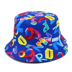 Close-up of navy bucket hat with colorful all-over graffiti alphabet letter prints