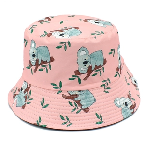 Detailed view of pink bucket hat with cute koala pattern and parallel stitching
